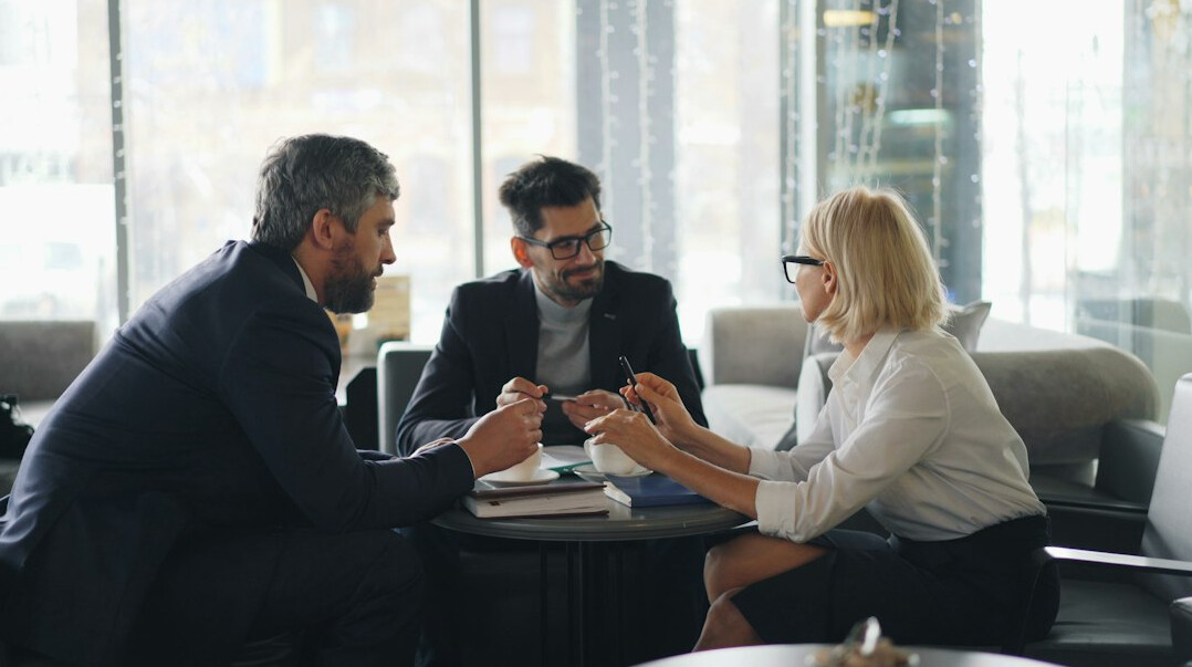 business team discussing insurance