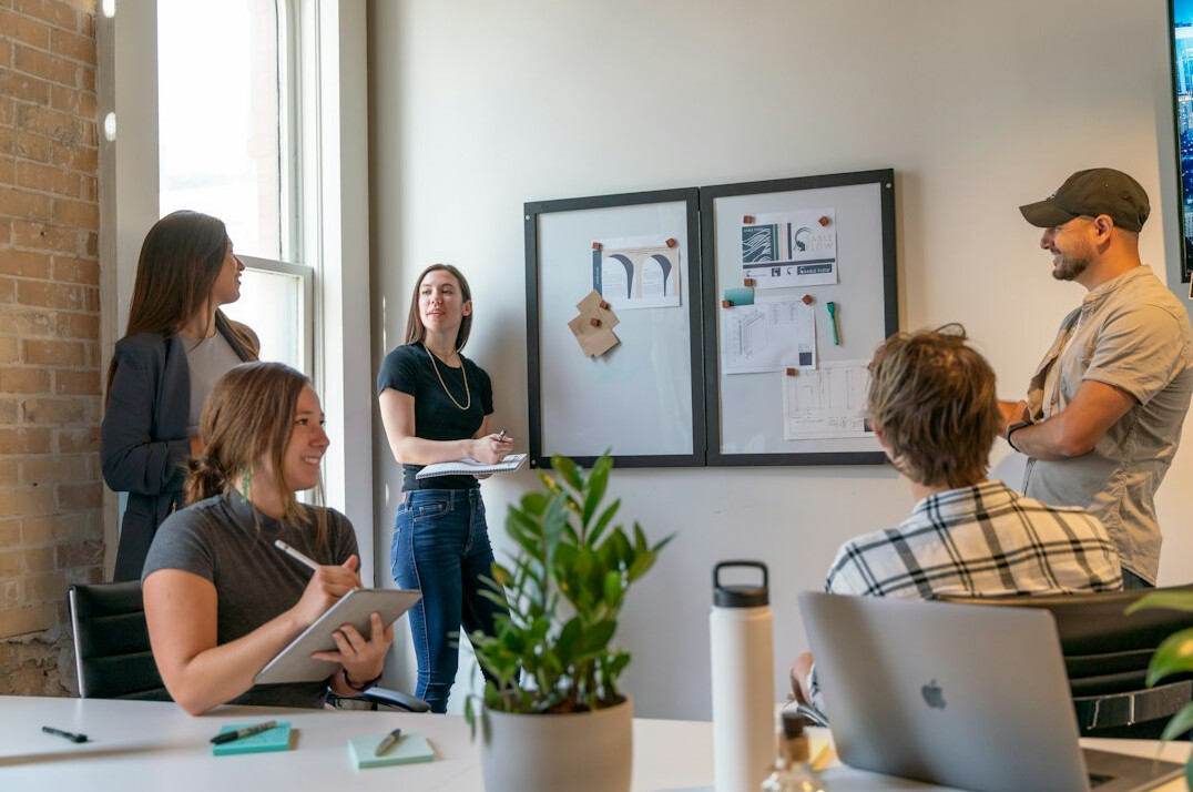 team discussing software